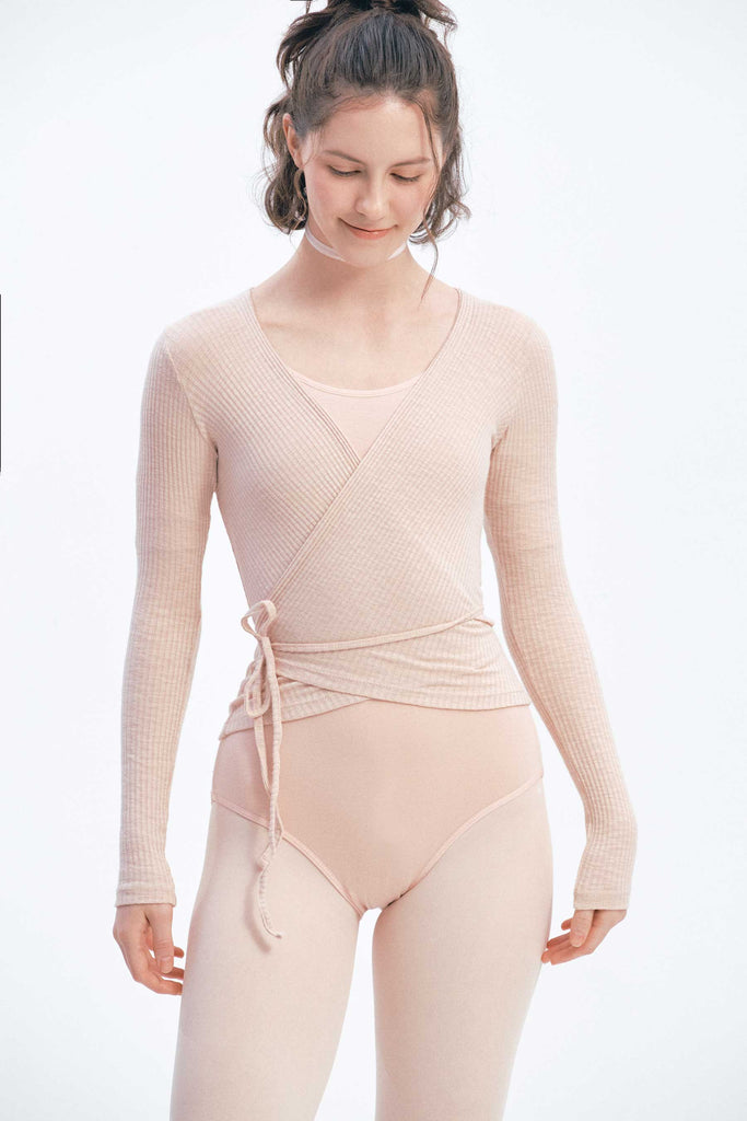 Close-up of ballet pink MODAL® wrap top’s sleek long sleeves SMK DANCEWEAR